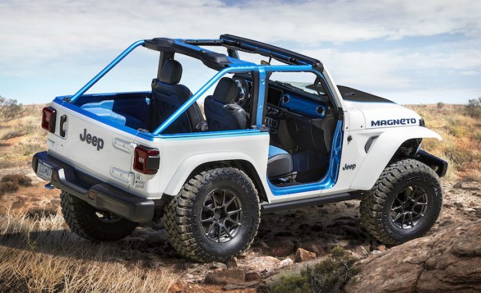 The exterior of the Jeep® Magneto BEV concept features a Bright White color with Surf Blue accents, along with a heavy-duty performance hood with center scoop and custom decal, redesigned rear gate and dramatic full-width forward lighting. Custom Royal Blue and Black leather seats with Sapphire-colored inserts and straps, Surf Blue truck bed liner and Mopar slush mats give the Magneto’s interior design an electrified appearance.